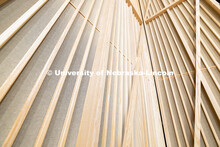 Wood and fabric panels line the walls of what will be an interactive performance space in the new Fi