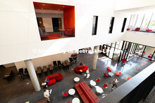 Students in the Orff Schulwerk Teacher Education Course practice with recorders in the lobby (common