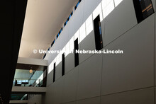 Morning light hits the top of practice room windows in the new the Fine and Performing Arts Building