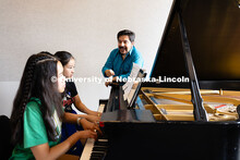 Marcelo Lian works with high school students on a piece by Frederic Chopin during the 2025 Lied Cent