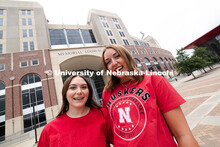 Sisters Madison and Lauren Haring outside of Memorial Stadium. The Haring family was featured in the