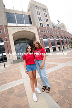 Sisters Madison and Lauren Haring outside of Memorial Stadium. The Haring family was featured in the
