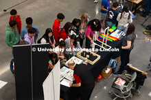 Students gather at the Ward's Science exhibit during the Science Olympiad National Tournament STEM E