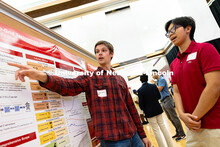 Kaleb Reiser, a senior studying electrical engineering, shares his summer research results with Ryan