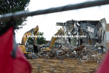 Excavators move debris from the site of the former Westbrook Music Building as the last of the north