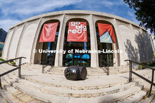 Signs hanging outside the Sheldon Memorial Art Gallery for the Go Big Red Exhibition. Summer on City