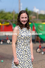 Portrait of Jenna Finch, Assistant Professor of Psychology, is pictured at the playground of the UNL