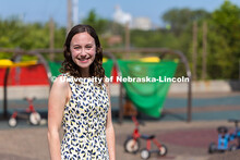 Portrait of Jenna Finch, Assistant Professor of Psychology, is pictured at the playground of the UNL