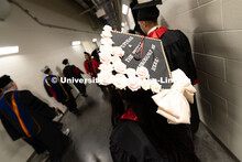 Yahaira Vazquez decorated her cap with roses and the words "Pupusas and the people brought me here."