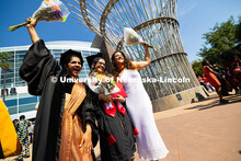 Anuradha Choudhary, Kashish Verma and Ana Clara Gomez pose together outside of Pinnacle Bank Arena. 
