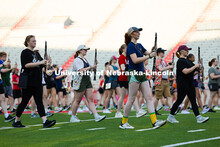 Keri Smith, a senior clarinet player, sports corn-themed socks during band camp during rehearsal on 