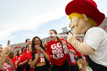 Students take selfies with Herbie Husker in Memorial Stadium after the tunnel walk. Tunnel Walk into