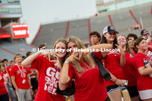 Lauren Bienz and Madi Ellmaker pose for a photo as students are directed out of Memorial Stadium aft
