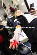 Allyson Hale, a first-year student in global studies, reads a comic while preparing to donate blood.