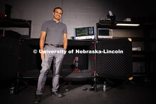 Shubhendu Bhardwaj, Associate Professor of Electrical and Computer Engineering, poses in the lab whe