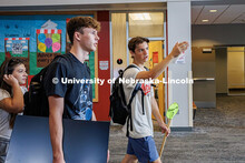 Riley Bry (right) a senior Sports Media and Communication/Broadcasting major and RA helps guide stud