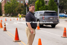 Josh Overocker, Associate Vice Chancellor for Student Life, smiles at families and students as they 