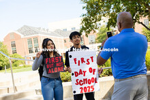 First-year students Natalia Aguallo and Ariel Larios pose for a photo with First-Gen Nebraska, which