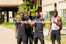 Ashriel Dixon, Desire Tonye Nyemeck, Amare Sanders and Brice Turner pose for a photo outside of Love