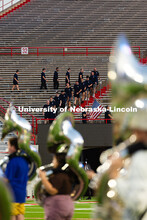 Members of the Lincoln Police Department complete the 9/11 stair climb as the UNL marching band begi