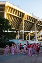 Husker students wear bibs outside of Memorial Stadium before the football game against Houston Chris