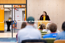 Liz Lorang, Dean of Libraries, speaks to audiences gathered for the opening of 1973 graduate Karen B