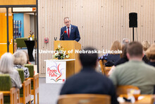 Mark Button, UNL executive vice chancellor, speaks to audiences gathered for the opening of 1973 gra