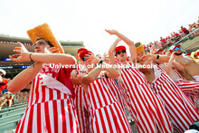 Friends and student section hype leaders Toby Ekdale, Dominic Dicarlo, Tom Dey and Landen Oppliger c
