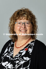 Studio portrait of Joann Ross, Staff Senate Coordinator and Honors Program Coordinator, University H