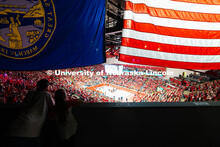 Randy Van Helten and his daughter, Braelyn, lean on the railing at the top of the Bob Devaney Sports