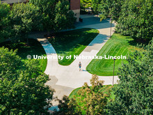 Aerial of student walking across UNL City Campus. City Campus Aerials. September 22, 2025. 