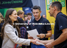 Senior Mechanical Engineering major, Olivia McKeag, shakes hands with a representative from Asset En