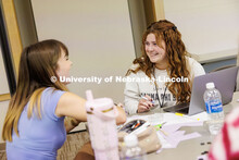 Natalia Vazquez, right, talks with Abby Halsey about their project inside Howard L. Hawks Hall. 2025