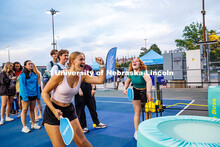 Holland Robinson celebrates a win against friend, Renny Maxwell, in a pickleball game challenge at t