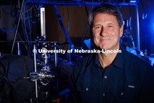 Herman Batelaan, Professor of Physics and Astronomy, poses for a portrait inside his lab in Jorgense