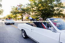 Chancellor Rodney Bennett tosses out candy from a vintage car during the homecoming parade. 2025 Hom