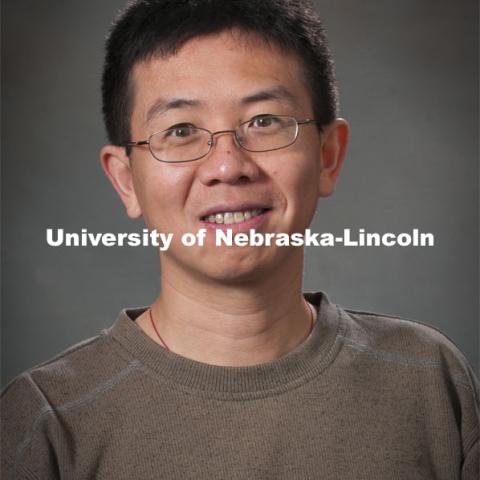 Pictured; Jiantao Guo, Assistant Professor, Chemistry. Academic Affairs, New Faculty Orientation, Studio Portrait. 100818, Photo by Greg Nathan, University Communications Photographer.