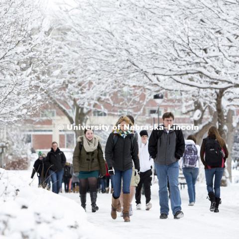 Students walk across campus following a snow storm. January 30, 2013. Photo by Craig Chandler / University Communications