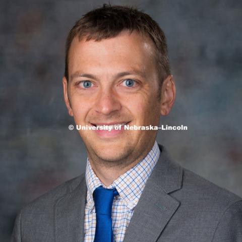 Studio portrait of Joshua Herr, New Faculty Photo Shoot, August 19, 2015. Photo by Greg Nathan, University Communications Photographer.