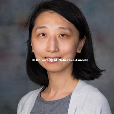 Studio portrait of Qi Zhang, New Faculty Photo Shoot, August 19, 2015. Photo by Greg Nathan, University Communications Photographer.