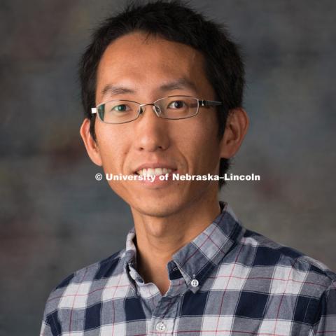 Studio portrait of Yuzhen Zhou, New Faculty Photo Shoot, August 19, 2015. Photo by Greg Nathan, University Communications Photographer.