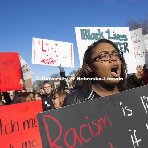 Kendall Dawson chants "Black Lives Matter" with the crowd at the end of the rally. Black Lives Matter rally filled the green space north of the Nebraska Union with several thousand students, faculty and staff Thursday. Ten students spoke on their thoughts and experiences. November 19, 2015. Photo by Craig Chandler / University Communications