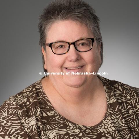 Studio portrait of Adonna Fleming, Library faculty/staff photo for web. May 4, 2016. Photo by Greg Nathan, University Communications Photographer.