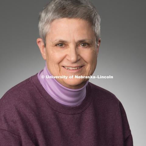 Studio portrait of Carole Goebes, Library faculty/staff photo for web. May 4, 2016. Photo by Greg Nathan, University Communications Photographer.