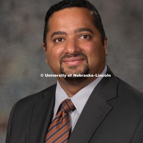 Studio portrait of Ajai Ammachathram, Assistant Professor, CEHS. New Faculty Orientation. August 29, 2016. Photo by Greg Nathan, University Communication Photography.