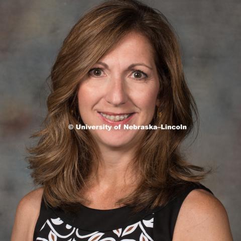 Studio portrait of Tammie Fischer, Assistant Professor, Economics. New Faculty Orientation. August 29, 2016. Photo by Greg Nathan, University Communication Photography.