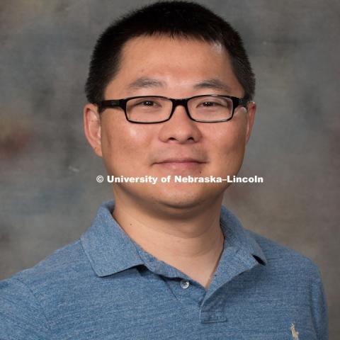 Studio portrait of Peng Peng, Assistant Professor, CEHS. New Faculty Orientation. August 29, 2016. Photo by Greg Nathan, University Communication Photography.