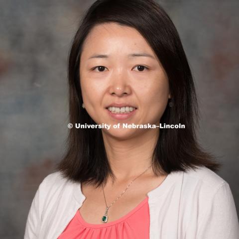 Studio portrait of Yingying Wang, Assistant Professor, CEHS. New Faculty Orientation. August 29, 2016. Photo by Greg Nathan, University Communication Photography.