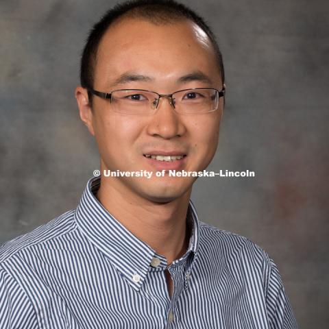 Studio portrait of Yuhang Xu, Assistant Professor, Statistics. New Faculty Orientation. August 29, 2016. Photo by Greg Nathan, University Communication Photography.