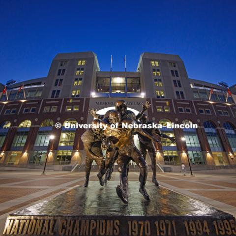 Memorial Stadium with the sculpture The Legacy lit up for the night on City Campus. September 26, 2016. Photo by Craig Chandler / University Communication Photography.